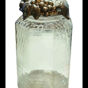 Glass Jar with Bronze Leaf Accent